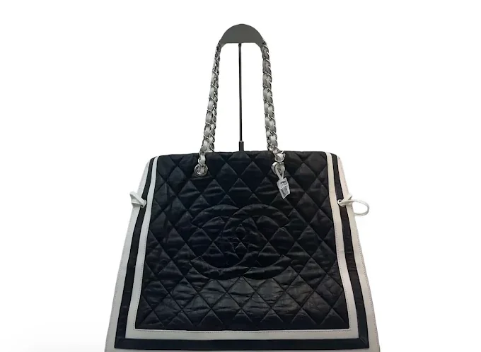 Black quilted chain-handle tote from the Sassy Sisters collection